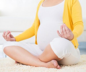 pregnant-asian-woman-doing-yoga